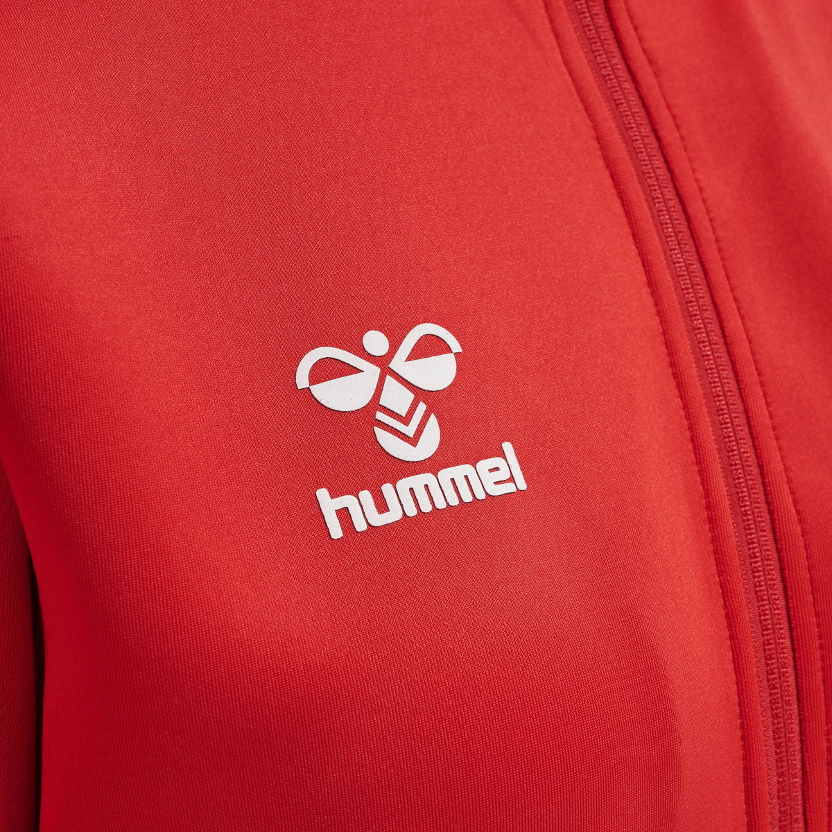 hmlCORE XK POLY ZIP SWEAT WOMAN